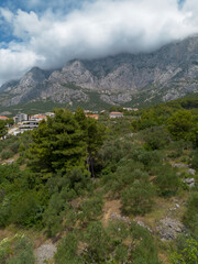 Aerial landscape. Clouds over the mountains. Adriatic coast of Croatia, Makarska