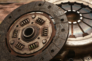 Car clutch basket on the car service workbench background. Top view. Close up.