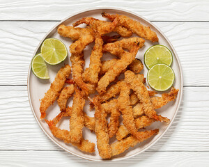 deep fried panko breaded shrimp on a plate