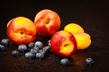 fresh nectarines in water drops	Palette with paints and canvases.
