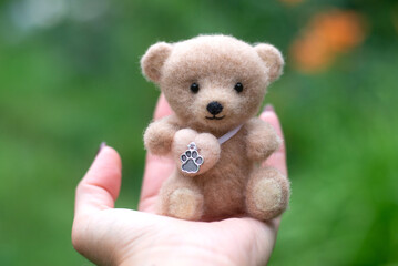 Small teddy bear made of wool