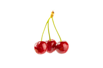 Cherry isolated. Fresh ripe cherries with leaves isolated on a white background.Sweet cherries pile. Berries and fruits. Vegan. Healthy eating.