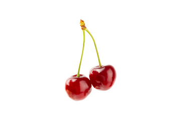 Cherry isolated. Fresh ripe cherries with leaves isolated on a white background.Sweet cherries pile. Berries and fruits. Vegan. Healthy eating.