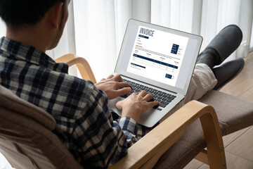 Invoice on computer screen from accounting application. Computer program for financial and budget of corporate business. Snugly.