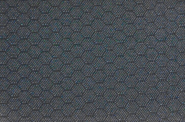Black fabric background with hexagon pattern, smooth texture, black fabric background, abstract background.