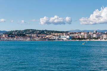 Fototapeta premium Panoramic view of the city of Cannes with old town, Palais des festivals, port, Provence, Cote d'Azur, France