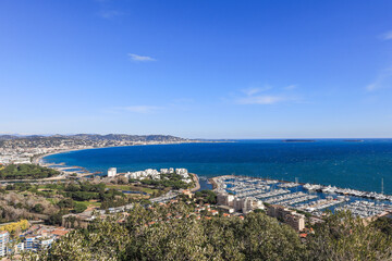 Fototapeta premium Panoramic view of the city of Cannes with old town, Palais des festivals, port, Provence, Cote d'Azur, France