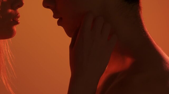 Young man and woman tender lovers faces shot, passion intimacy touching, candid feelings, hair caressing. Love and affection relationships concept.