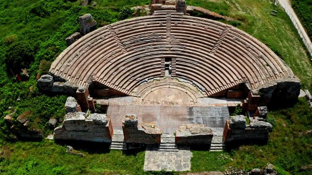 Aerial drone shot of the Theatre of Dodona in the Epirus region in Greece. Drone view over ancient historical greek amphitheater. Archaeological site.