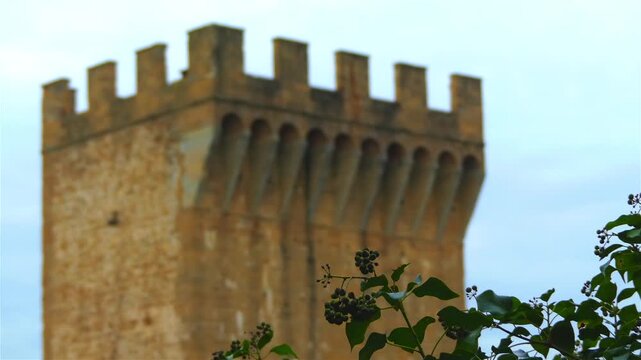 Focus transition: Gates of Saint Nicholas (Porta San Niccolo) is part of walls of Florence, Italy and is located in Piazza Giuseppe Poggi, in Oltrarno. Because of its massive appearance.