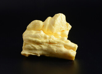 Solid sulfur or sulphur, one of chemical elements in lemon yellow, from Ijen crater in East Java,...