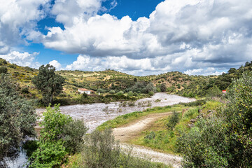 Hiking along the river Vascao located near Gioes in the Algarve region in Portugal.