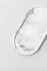 Cosmetics product presentation scene made with marble oval tray, perfect for displaying jewelry,...