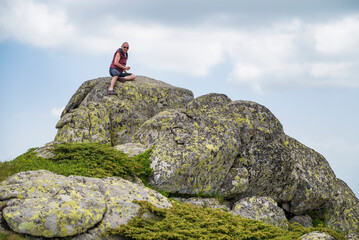 
Senior man in the high summer mountain with stunning view  . Vitosha mountain ,Bulgaria
