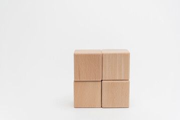 Obraz premium Wooden Blocks Arranged In Ascending Order On White Background