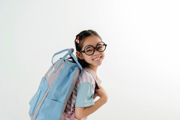 Happy Young Girl Wearing Graduation Cap and Glasses Holding Fist Up