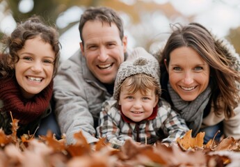 Fototapeta premium Happy Family In Autumn Leaves