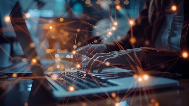 Close-up of hands typing on a laptop keyboard with abstract network connections overlay, representing technology and communication.