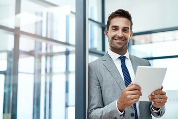 Fototapeta premium Portrait, smile and tablet with business employee in office for corporate administration, planning or research. App, email and website with face of happy man in professional workplace for information