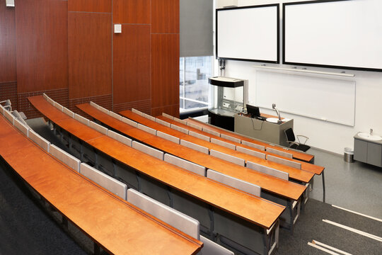 Empty chemistry lecture theatre with raked seats at a university. 