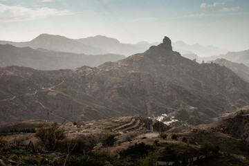 panoramic view of mountains in Tejeda area on Gran Canaria island, Canary Islands, Spain. National park volcanic nature. Aerial view of village in mountain landscape.