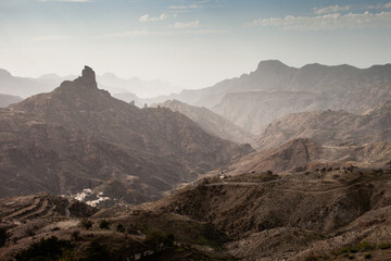 panoramic view of mountains in Tejeda area on Gran Canaria island, Canary Islands, Spain. National park volcanic nature. Aerial view of village in mountain landscape.