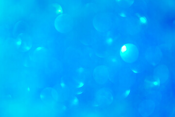 Abstract blue background with sequins. Brilliant backdrop