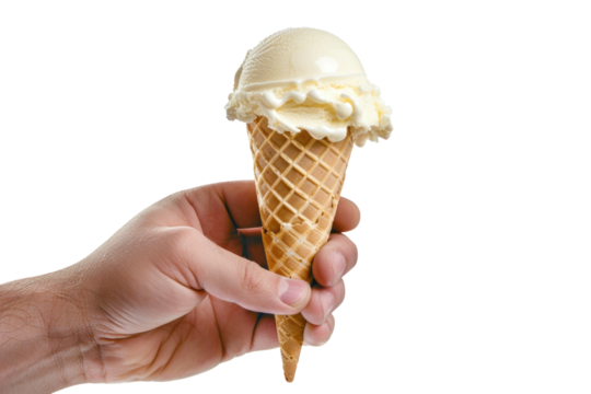 A hand holds a perfectly formed vanilla ice cream cone, the white background highlighting its crisp edges.