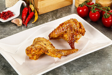 Tasty roasted chicken wing with spices