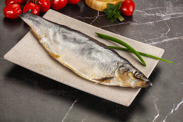 Whole raw salted herring fish