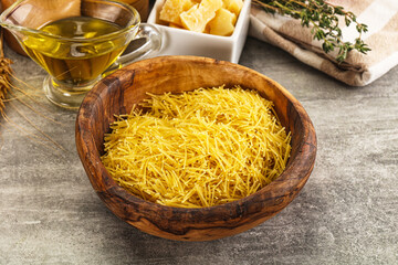 Raw dry Italian pasta Vermicelli