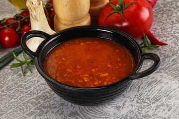 Hot tomato soup with diced chicken