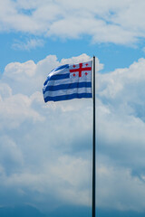 The Adjara flag is the official flag of the Adjara Autonomous Republic of Georgia. It was adopted by the Supreme Council of Adjara in 2004.