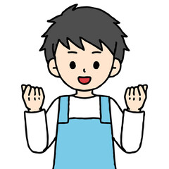 男性の保育士がガッツポーズをしている