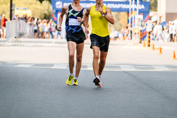 racewalking marathon, two leading men athlete a distance race
