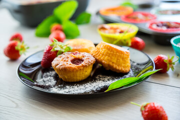 Sweet curd muffins with strawberry filling