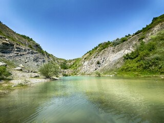 A wonderful landscape in the Carpathian mountains with a view of the lake between the rocks in...