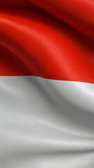 Naklejka premium Indonesian flag waving the red and white flag represents symbol of courage and purity, picture the flag of Indonesia