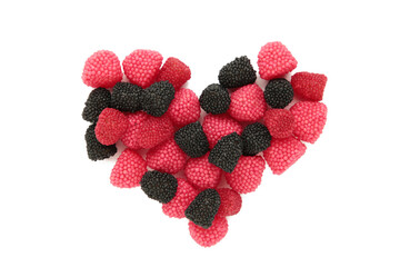 Red chewing sweets in the form of berries isolated on white background. Shape of heart