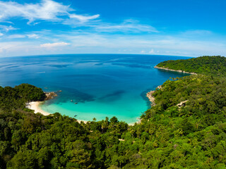 Obraz premium Amazing top view beach Aerial view of Tropical beach sea in the beautiful Phuket island Located at Freedom beach Phuket Thailand,Wide angle view seascape nature background