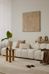Cosy and stylish interior design of living room with modular white sofa, wooden furnitures,...