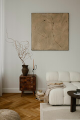 A stylish, minimalist living room area featuring a mid-century modern commode with a cozy...