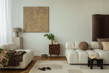 A stylish living room interior with white sofas, a wooden side table, abstract wall art, and minimalist decor. The space includes a soft rug, indoor plants, and cozy accents, creating a serene.