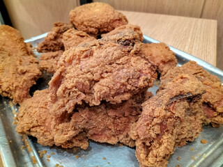 View of fried chicken in gray plate. Fast food menu-Crispy Chicken.

