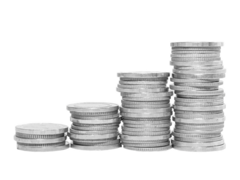 Stacks of silver coins arranged in ascending order, symbolizing growth, investment, wealth accumulation, and financial success on a white background