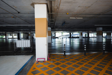 Empty parking lot indoor of supermarket
