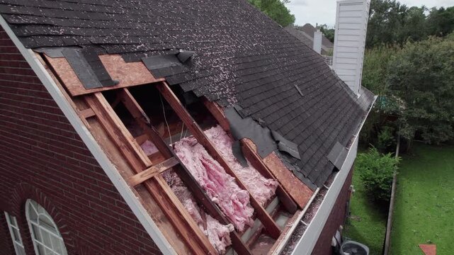 roof damage from hurricane Beryl
