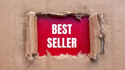 Best seller message writing on ripped torn cardboard paper with red background