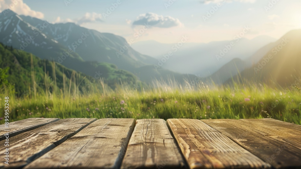 Poster wooden table top on blur mountain and grassy field background. ideal for fresh and relaxed product d