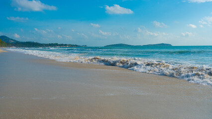 Sea beach wave turquoise water sunny day blue sky with cloud summer vacation